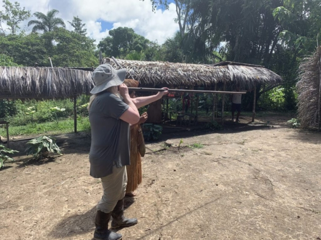 Native visit Veryle with blow gun
